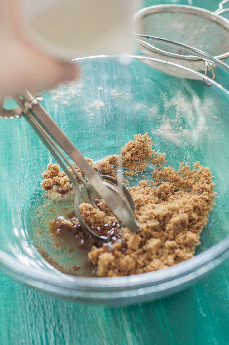 Mixing sugar and oil for whole wheat banana bread